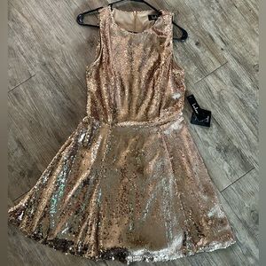 Sparkling Gold Sequin Sleeveless Dress – perfect for special occasions!